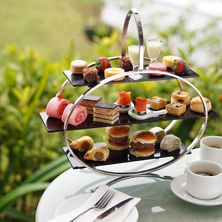 Grand Coloane Resort Макао Экстерьер фото Afternoon tea at the InterContinental Sanctuary Cove Resort, Queensland, Australia