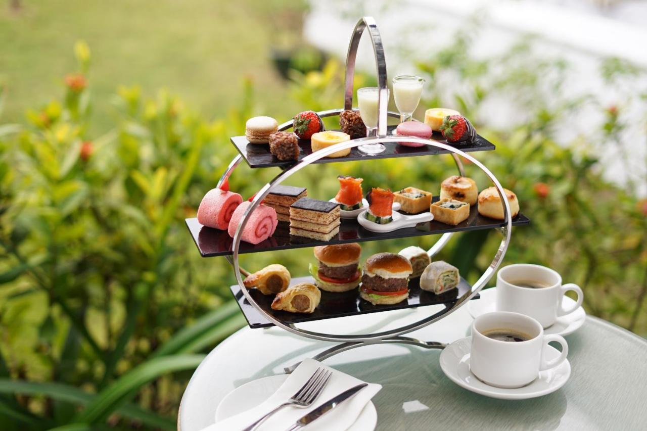 Grand Coloane Resort Макао Экстерьер фото Afternoon tea at the InterContinental Sanctuary Cove Resort, Queensland, Australia